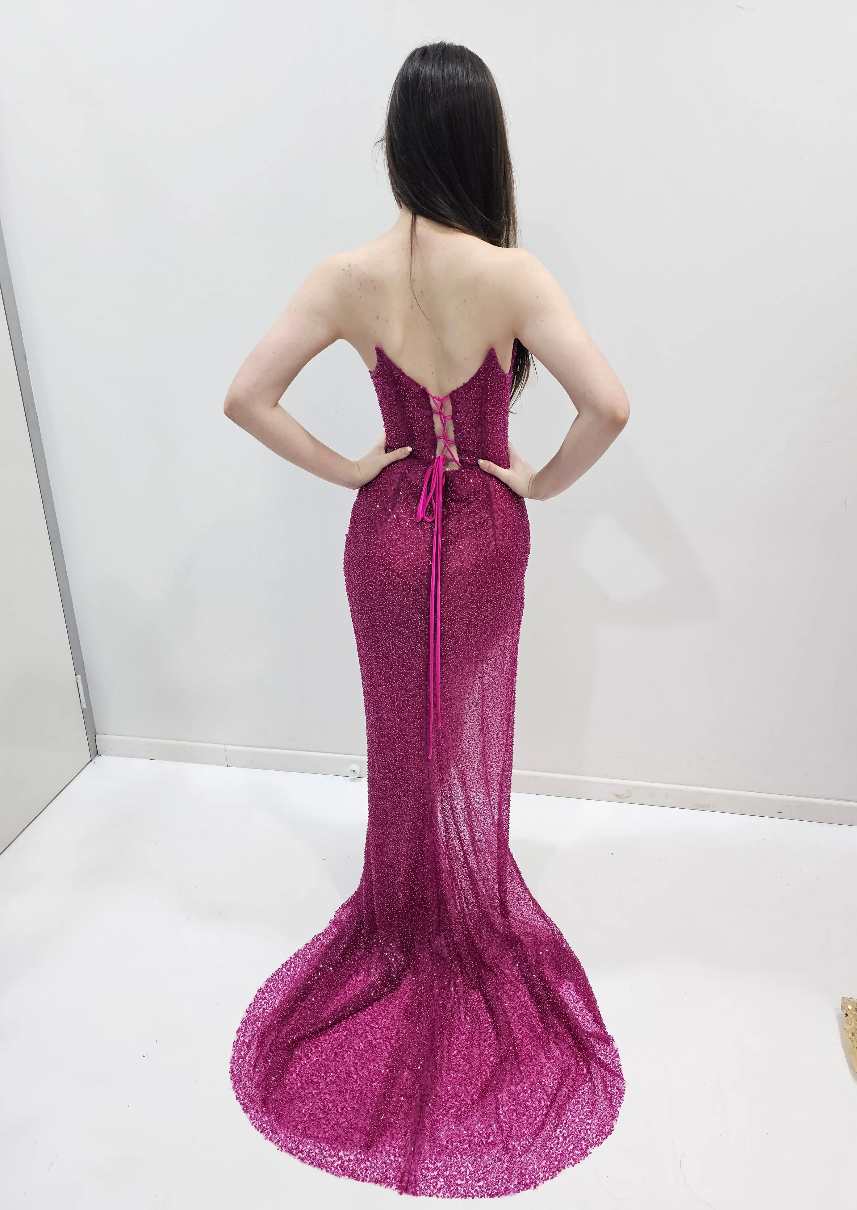 Beaded magenta strapless corset dress for hire