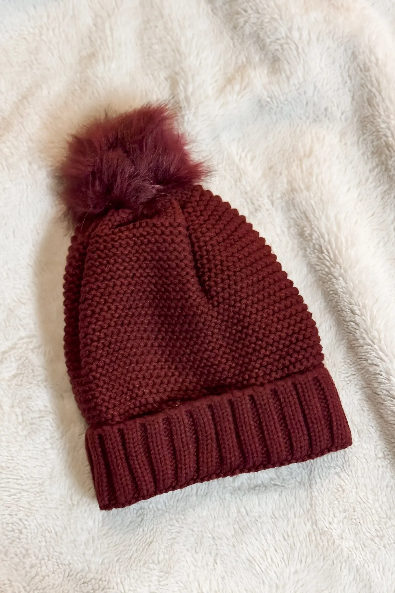 Pom Beanie in Burgundy with Faux Sherpa Lining